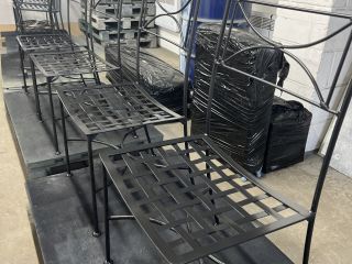 Collection of black metal patio furniture pieces restored by Blast Spray Polish, featuring tables and chairs with geometric designs.